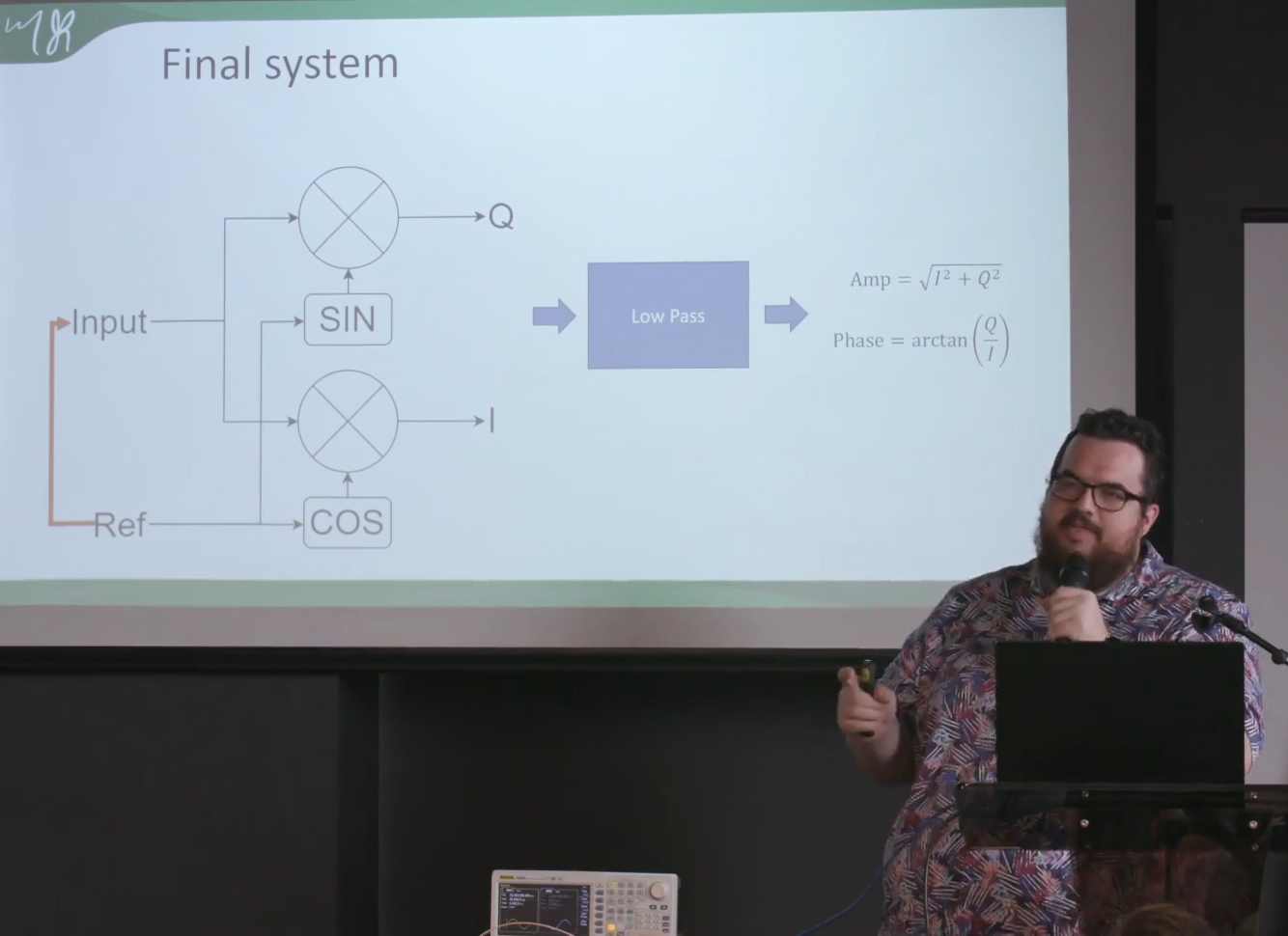 Mark Omo presenting a lock-in amplifier DSP system at Hackaday Superconference 2024
